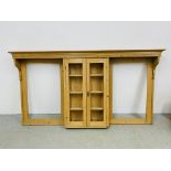 A WAXED PINE DRESSER BACK WITH CENTRAL TWO DOOR CUPBOARD A/F