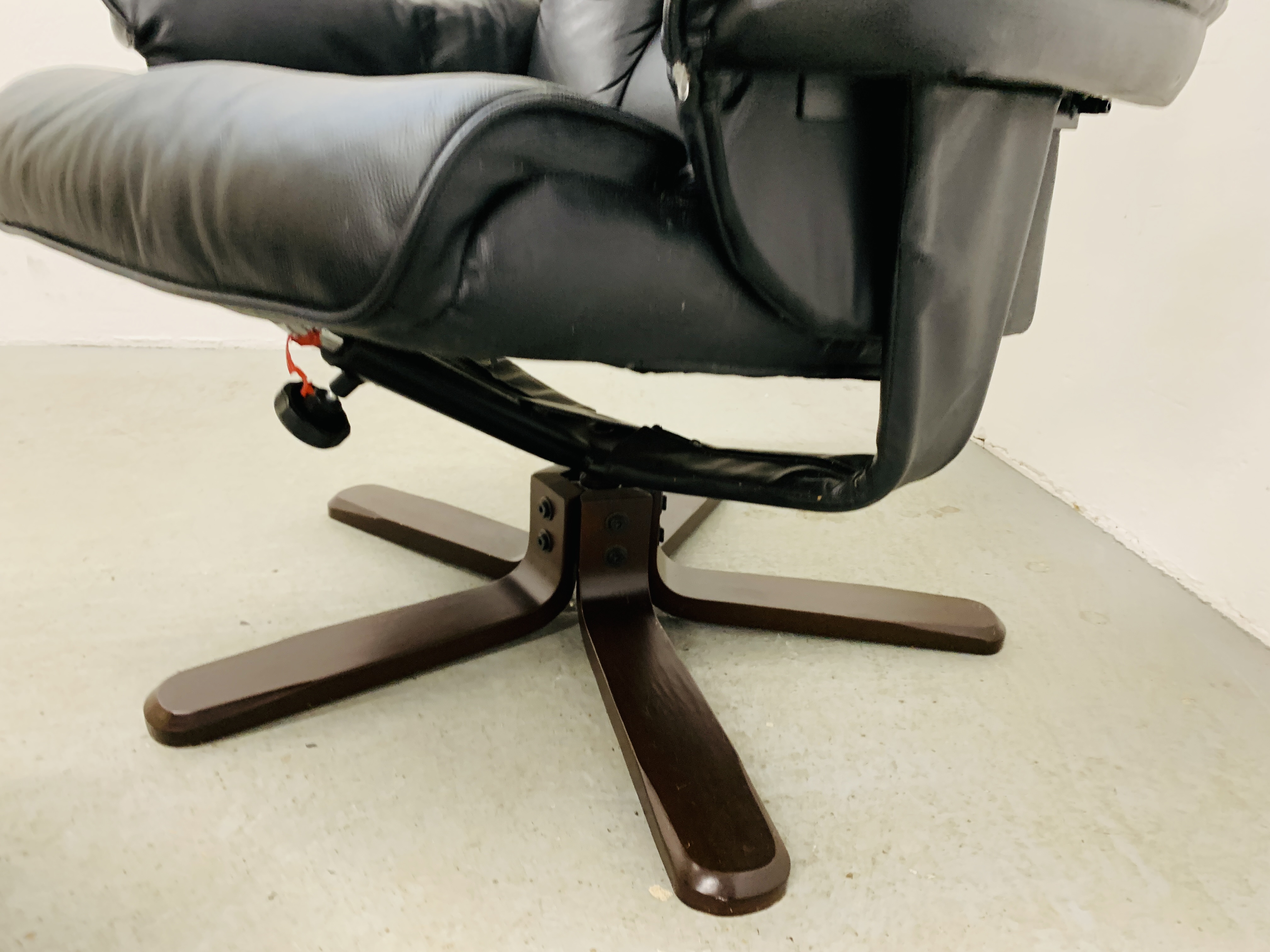 A BLACK LEATHER RELAXER CHAIR AND MATCHING FOOT STOOL. - Image 6 of 8