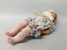 A MID C20TH DOLL WITH CERAMIC HEAD, DAMAGED AND REPAIRED, MARKED JUBILEE, FOREIGN REGISTERED DESIGN,