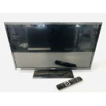 A POLAROID 32 INCH FLAT SCREEN TV MODEL P32LED13 - SOLD AS SEEN.