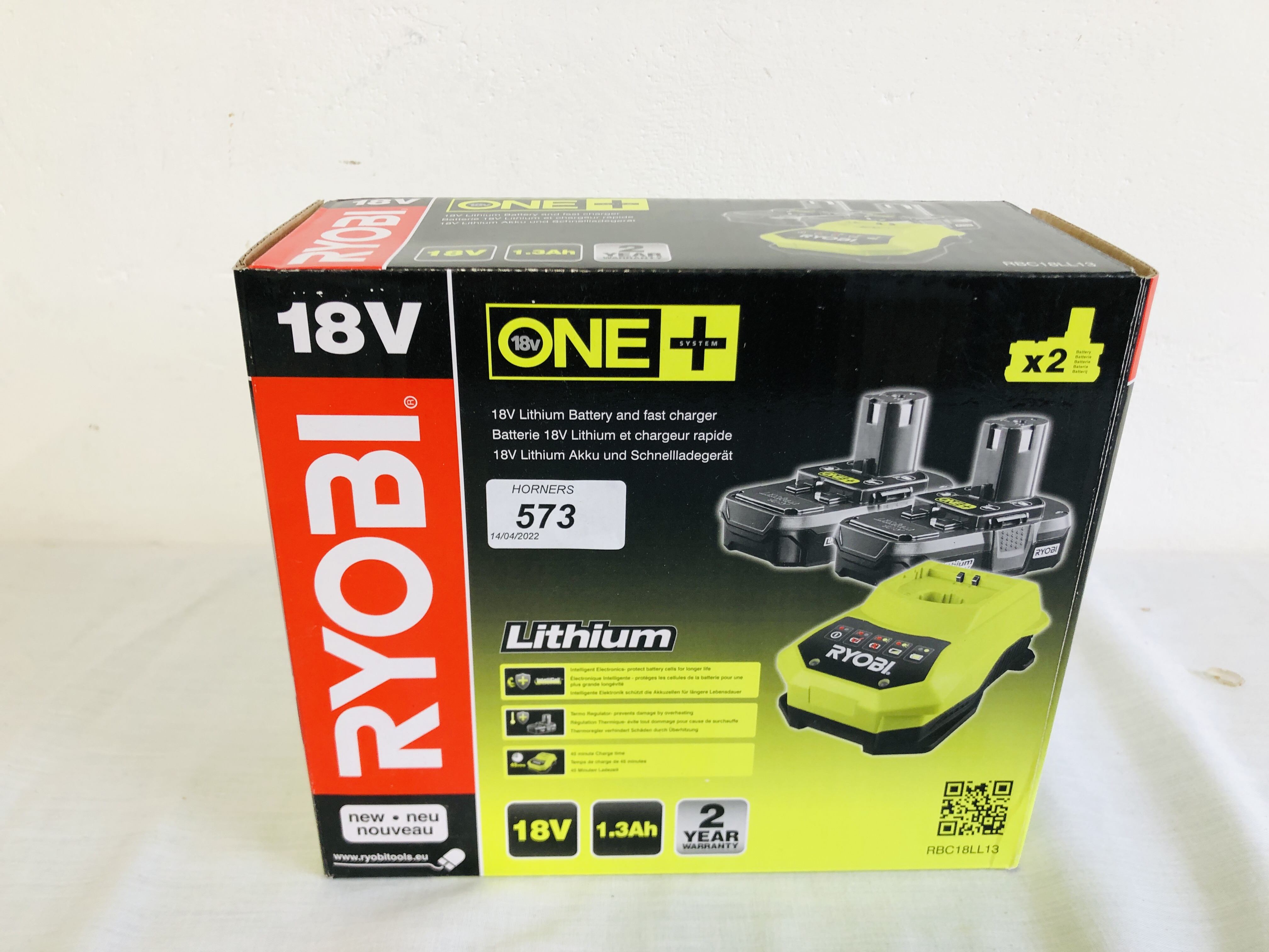 RYOBI 18 VOLT ONE+ 2X1.3AH 18 VOLT BATTERY PACK AND CHARGER (BOXED AS NEW) - SOLD AS SEEN.