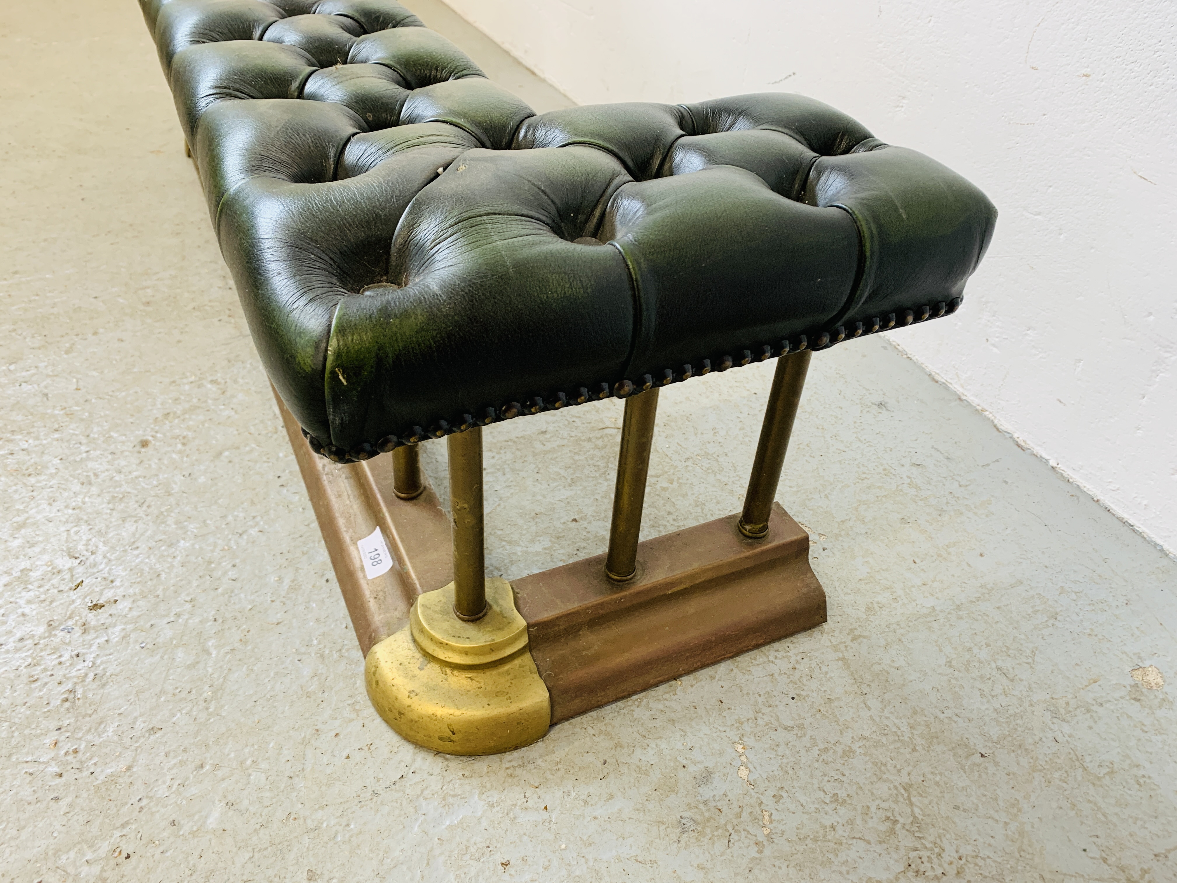 A BRASS FIRE CURB SEAT, THE GREEN LEATHER BUTTON BACK SEAT REQUIRING RESTORATION - MAX. - Image 4 of 10