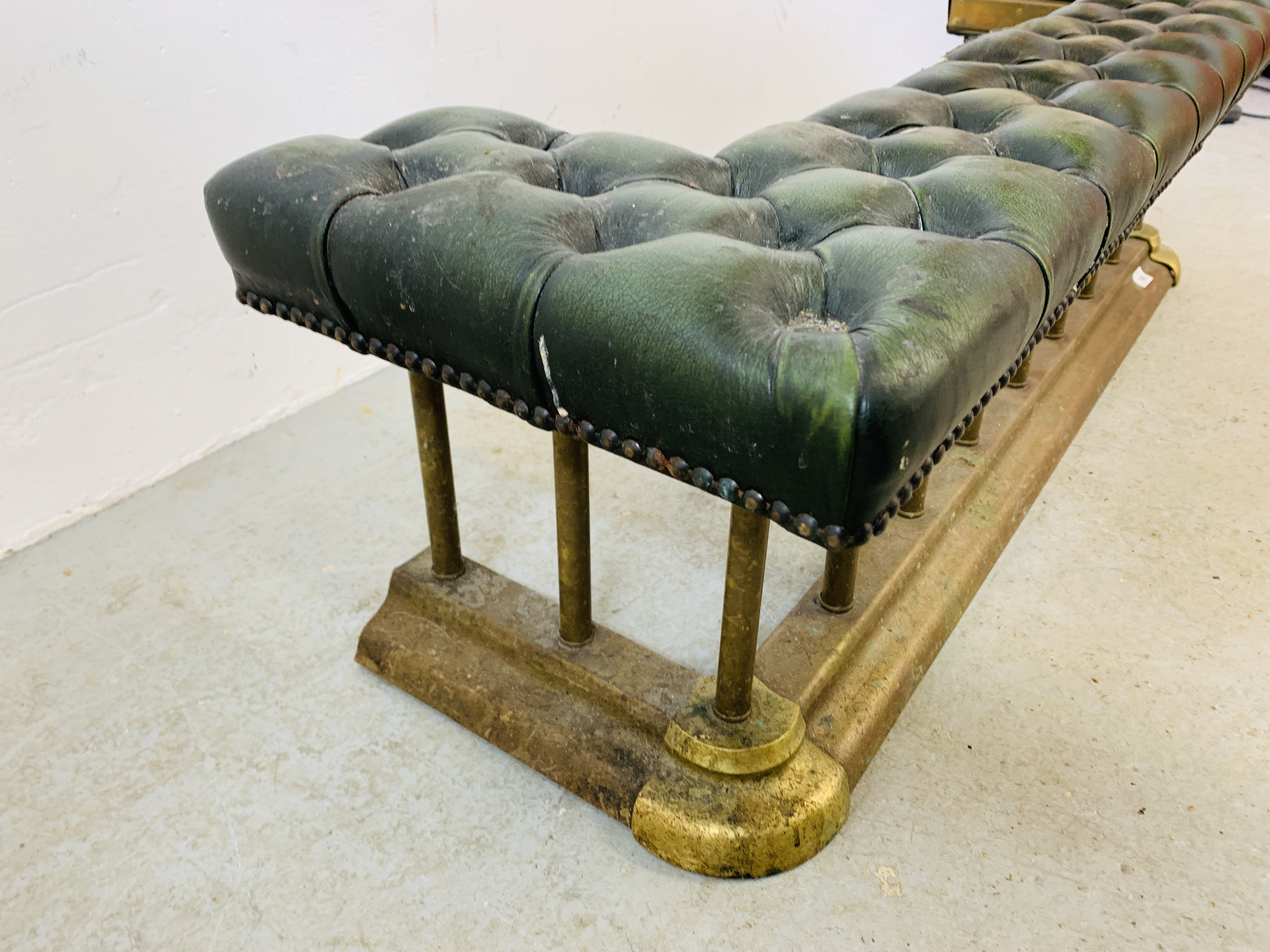 A BRASS FIRE CURB SEAT, THE GREEN LEATHER BUTTON BACK SEAT REQUIRING RESTORATION - MAX. - Image 9 of 10