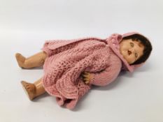 A MID C20TH COMPOSITION DOLL, LATER DRESS, MINOR DAMAGE TO FACE, GO TO SLEEP EYES, HEIGHT 50CM.