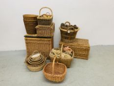A COLLECTION OF ASSORTED WICKER AND CANE BASKETS (APPROX.