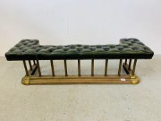 A BRASS FIRE CURB SEAT, THE GREEN LEATHER BUTTON BACK SEAT REQUIRING RESTORATION - MAX.