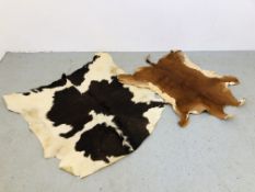 2 X COWHIDE RUGS 110CM. X 105CM.