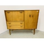 A G-PLAN EGOMME COMBINATION TEAK SIDEBOARD WIDTH 130CM. DEPTH 44CM. HEIGHT 112CM.