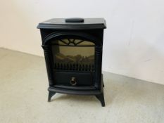 AN ELECTRIC LOG EFFECT ROOM HEATER - SOLD AS SEEN.