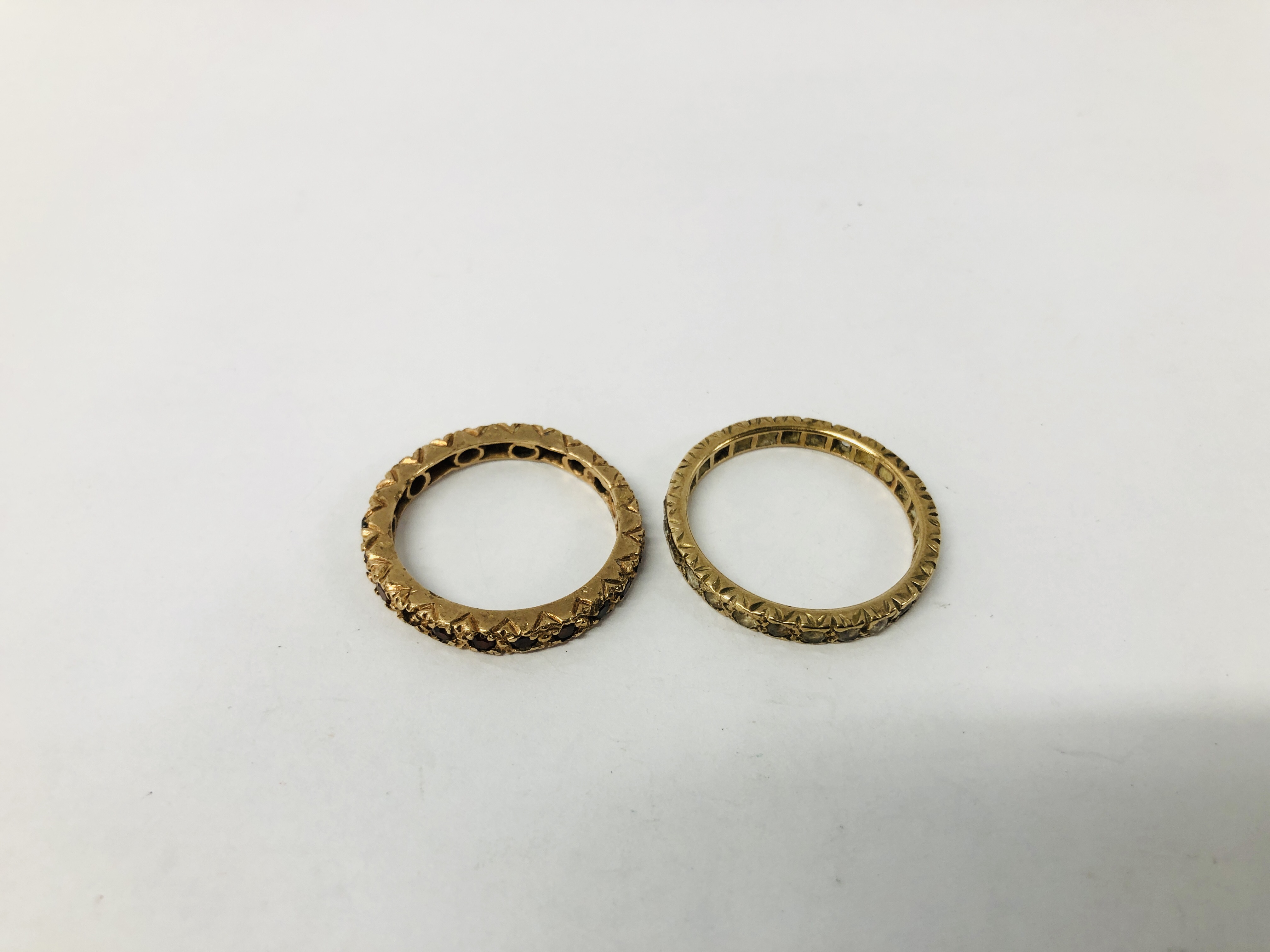 A YELLOW METAL ETERNITY RING, - Image 2 of 11