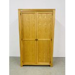 A MODERN RUSTIC OAK TWO DOOR WARDROBE WITH INTERIOR SHELF AND CLOTHES RAIL WIDTH 97CM. DEPTH 51CM.