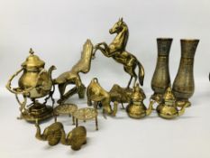 A BOX OF HEAVY DECORATIVE BRASSWARE TO INCLUDE RAMPANT HORSE, EAGLE, ELEPHANTS, SPIRIT KETTLE,