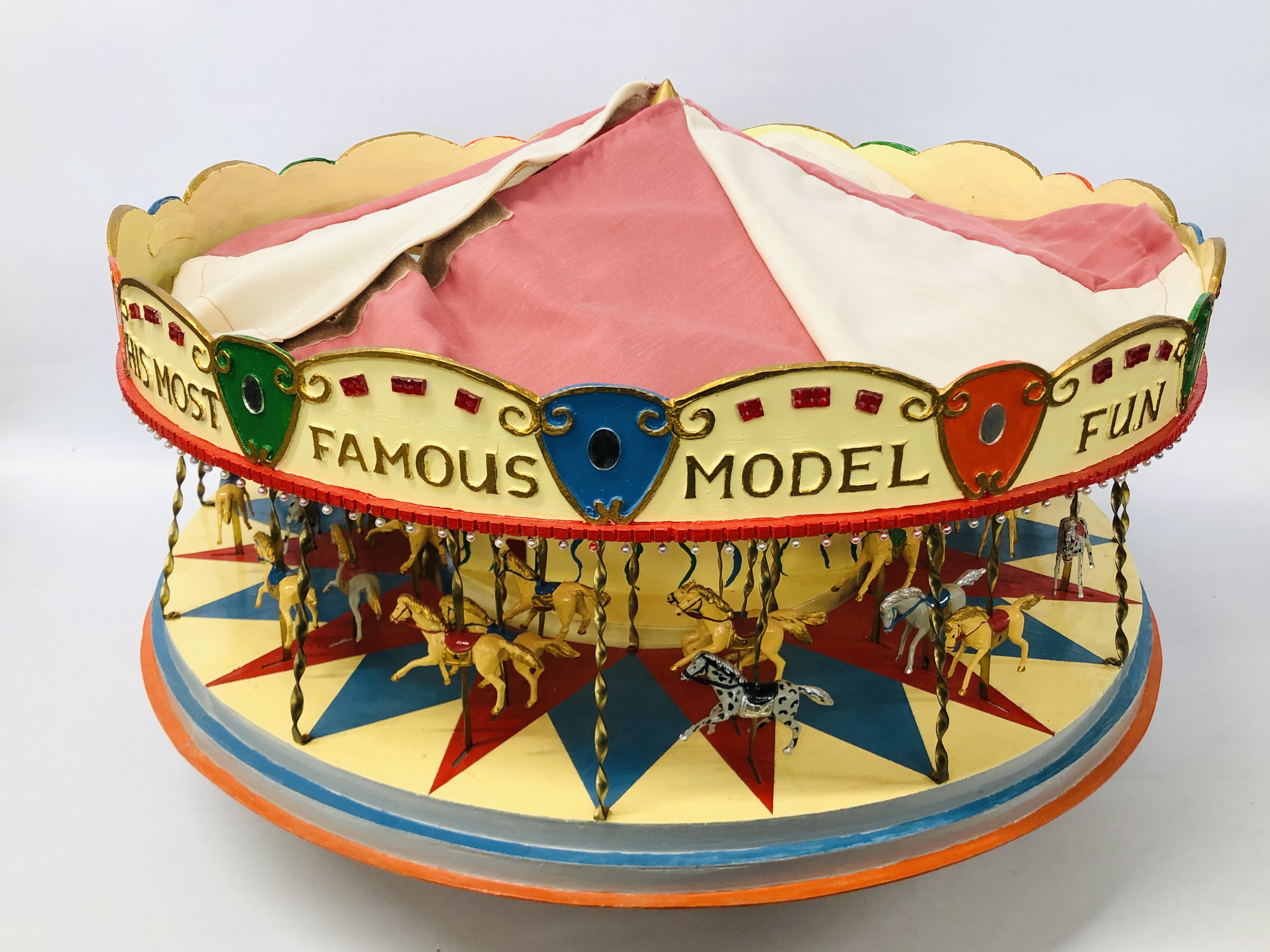 A VINTAGE HANDCRAFTED WOODEN MODEL OF A FAIRGROUND CAROUSEL WITH MOTORISED ACTION AND LIGHTS - - Image 2 of 10