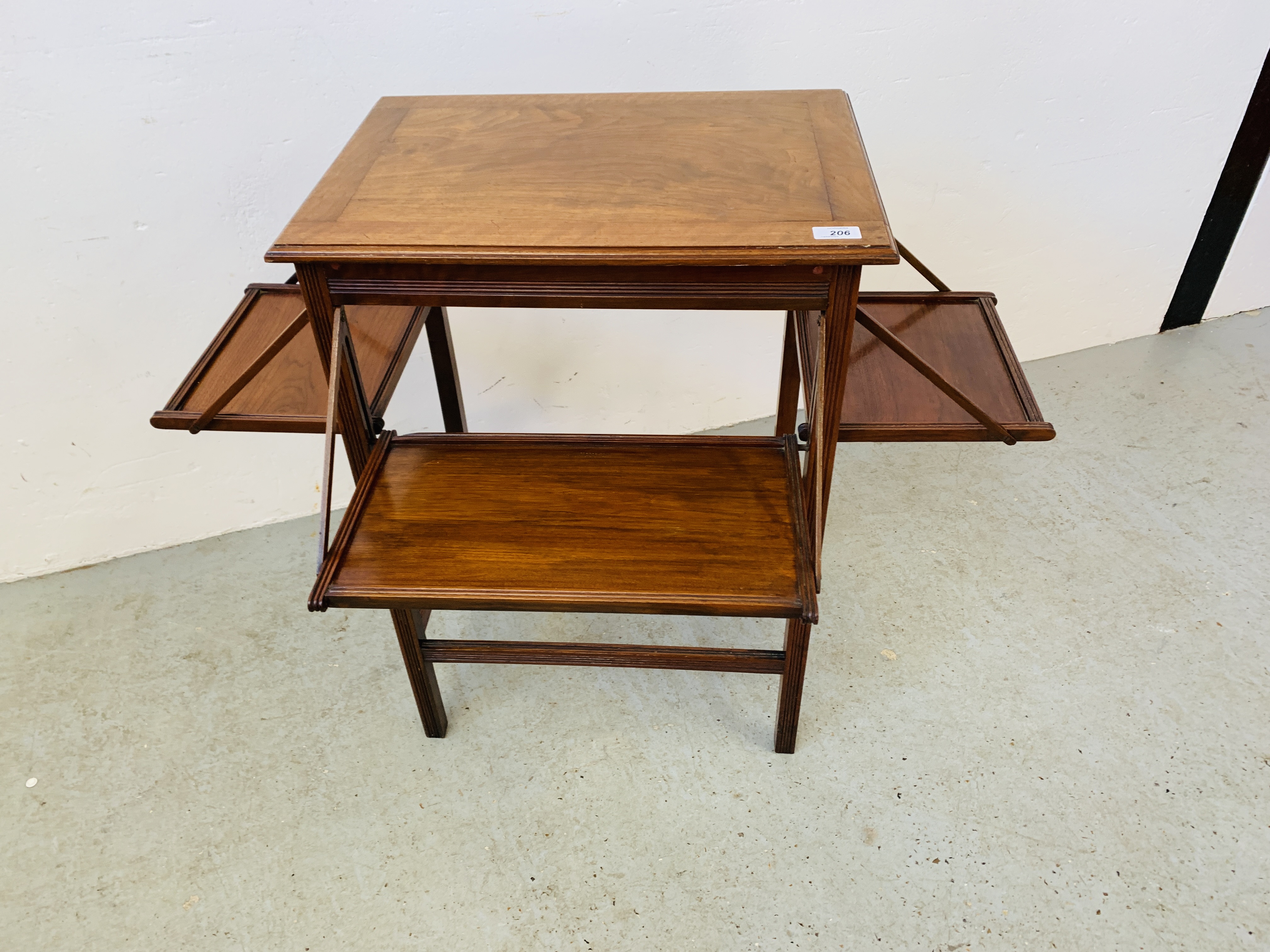 EDWARDIAN MAHOGANY OCCASIONAL TABLE WITH CANTILEVER TRAYS.