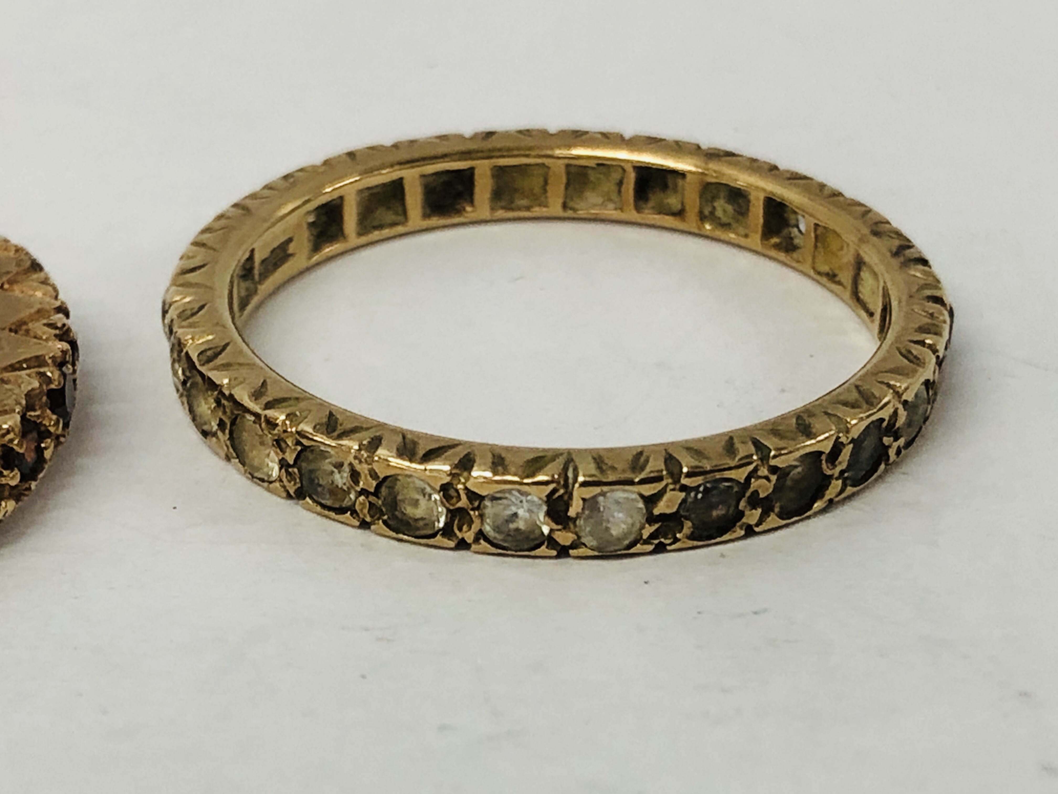 A YELLOW METAL ETERNITY RING, - Image 6 of 11