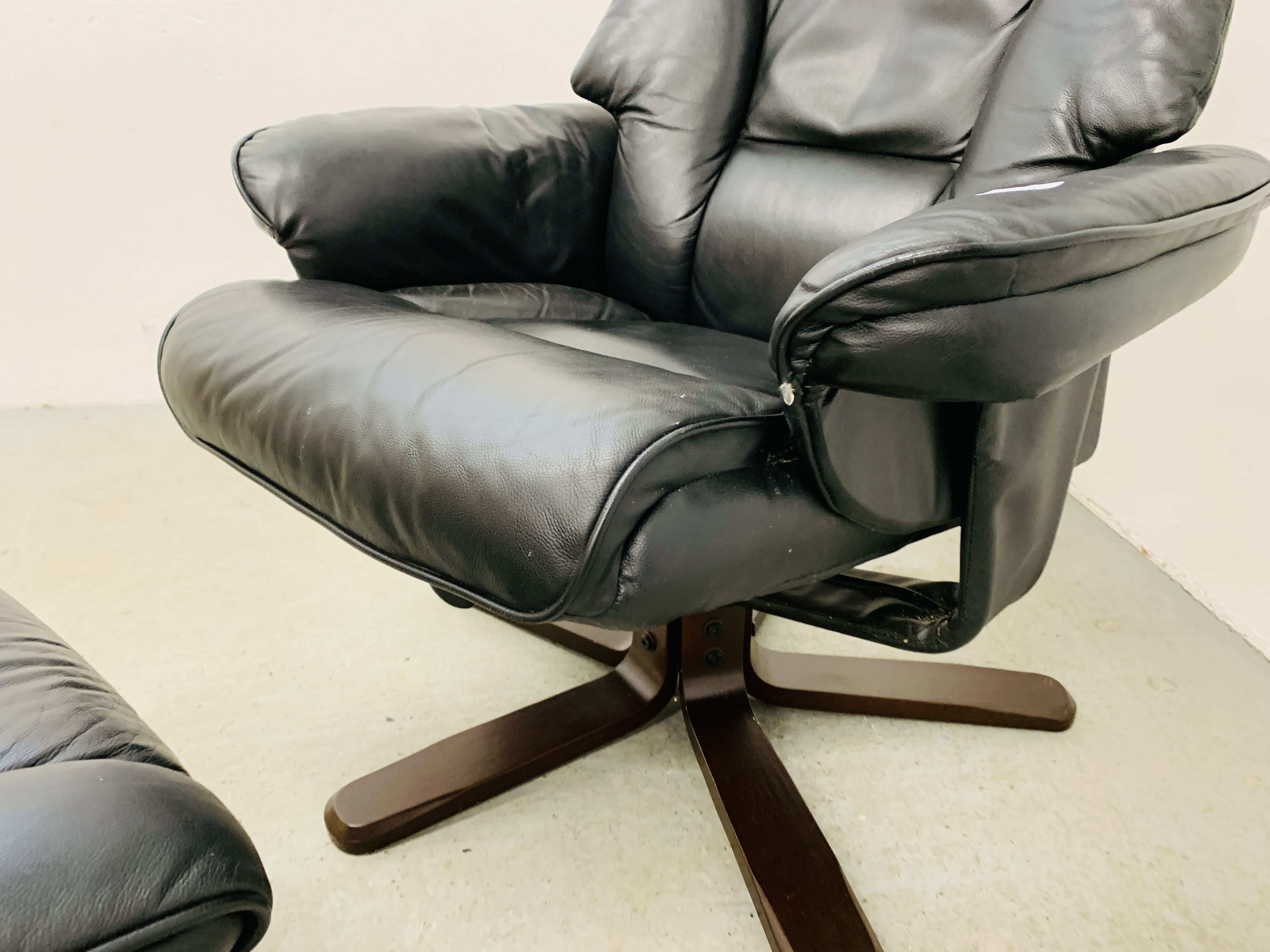 A BLACK LEATHER RELAXER CHAIR AND MATCHING FOOT STOOL. - Image 5 of 8