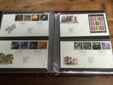 BOX WITH 1971 - 2000 BUREAU FIRST DAY COVER COLLECTION IN FOUR ROYAL MAIL ALBUMS,