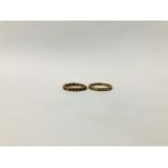 A YELLOW METAL ETERNITY RING,