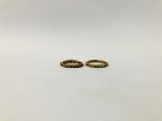 A YELLOW METAL ETERNITY RING,