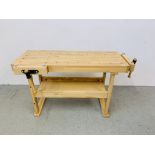 AN AS NEW BEECHWOOD CARPENTRY BENCH FITTED WITH TWO VICES LENGTH 135CM.