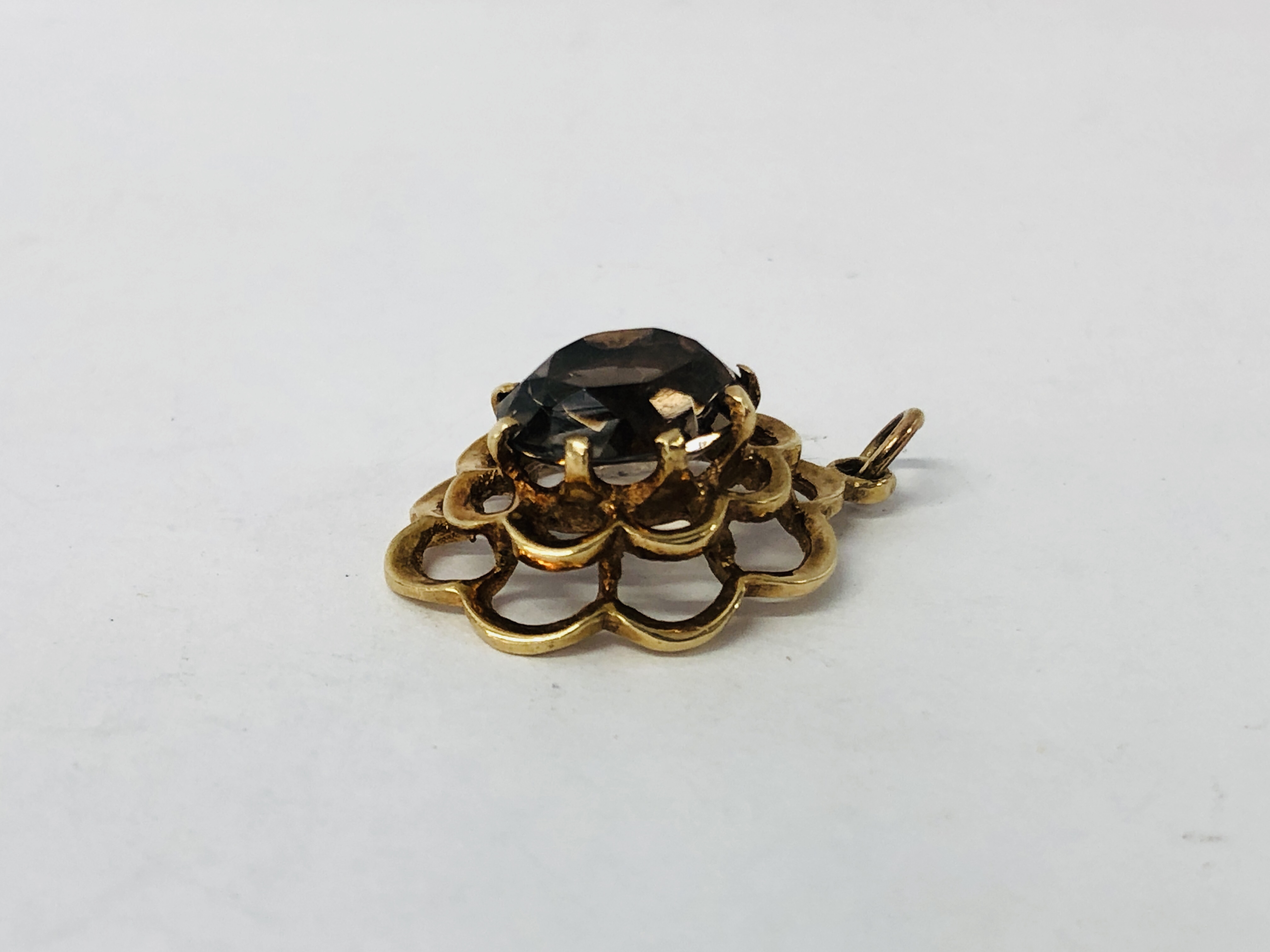 A SMOKY TOPAZ PENDANT, CLAW SET IN AN 9CT GOLD FRAME. - Image 2 of 7