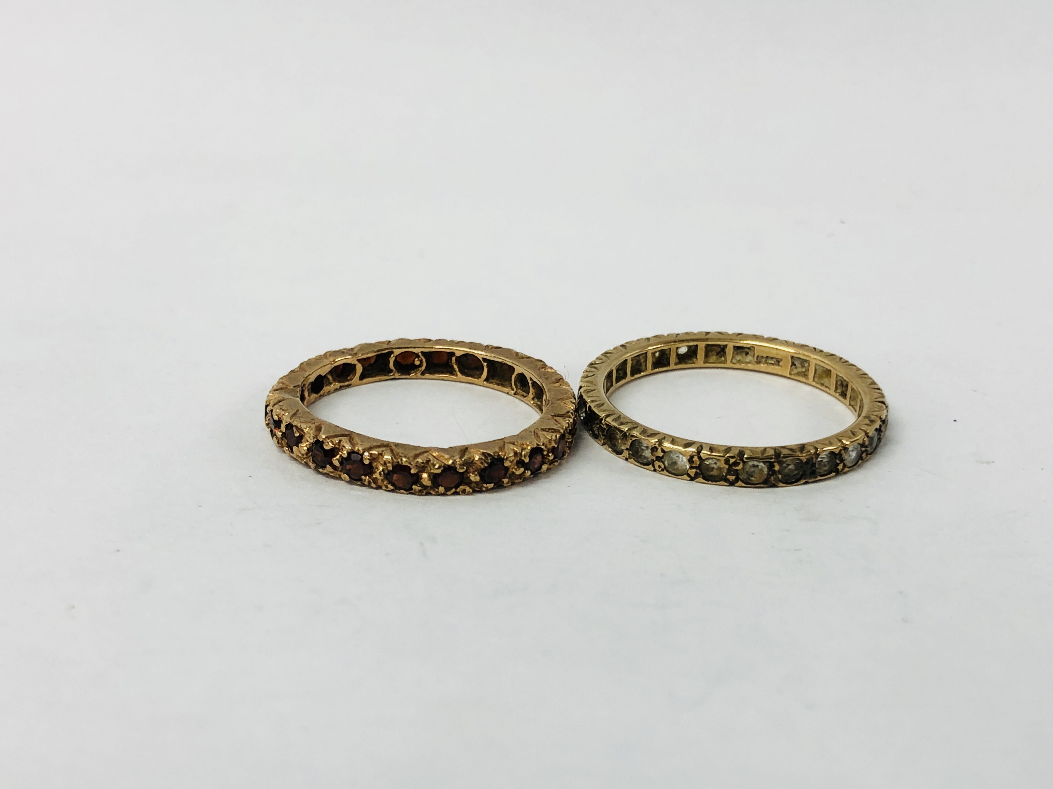 A YELLOW METAL ETERNITY RING, - Image 3 of 11