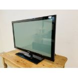 SAMSUNG 42 INCH TELEVISION WITH REMOTE - SOLD AS SEEN.