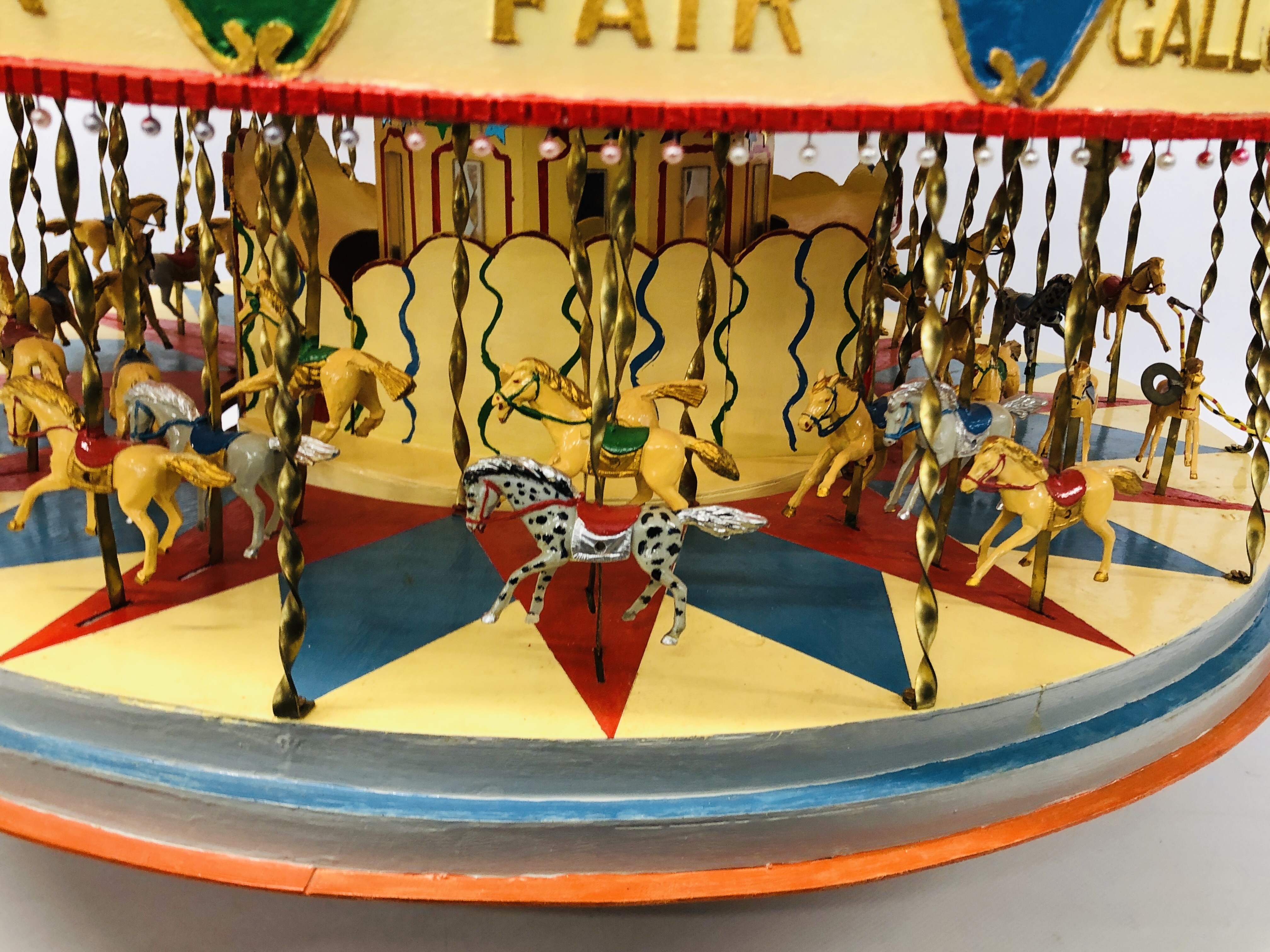 A VINTAGE HANDCRAFTED WOODEN MODEL OF A FAIRGROUND CAROUSEL WITH MOTORISED ACTION AND LIGHTS - - Image 3 of 10