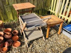 A HARDWOOD TEAK FOLDING GARDEN TABLE 60CM X 60CM, A HARDWOOD TEAK BBQ TROLLEY AND A HARDWOOD OCC.