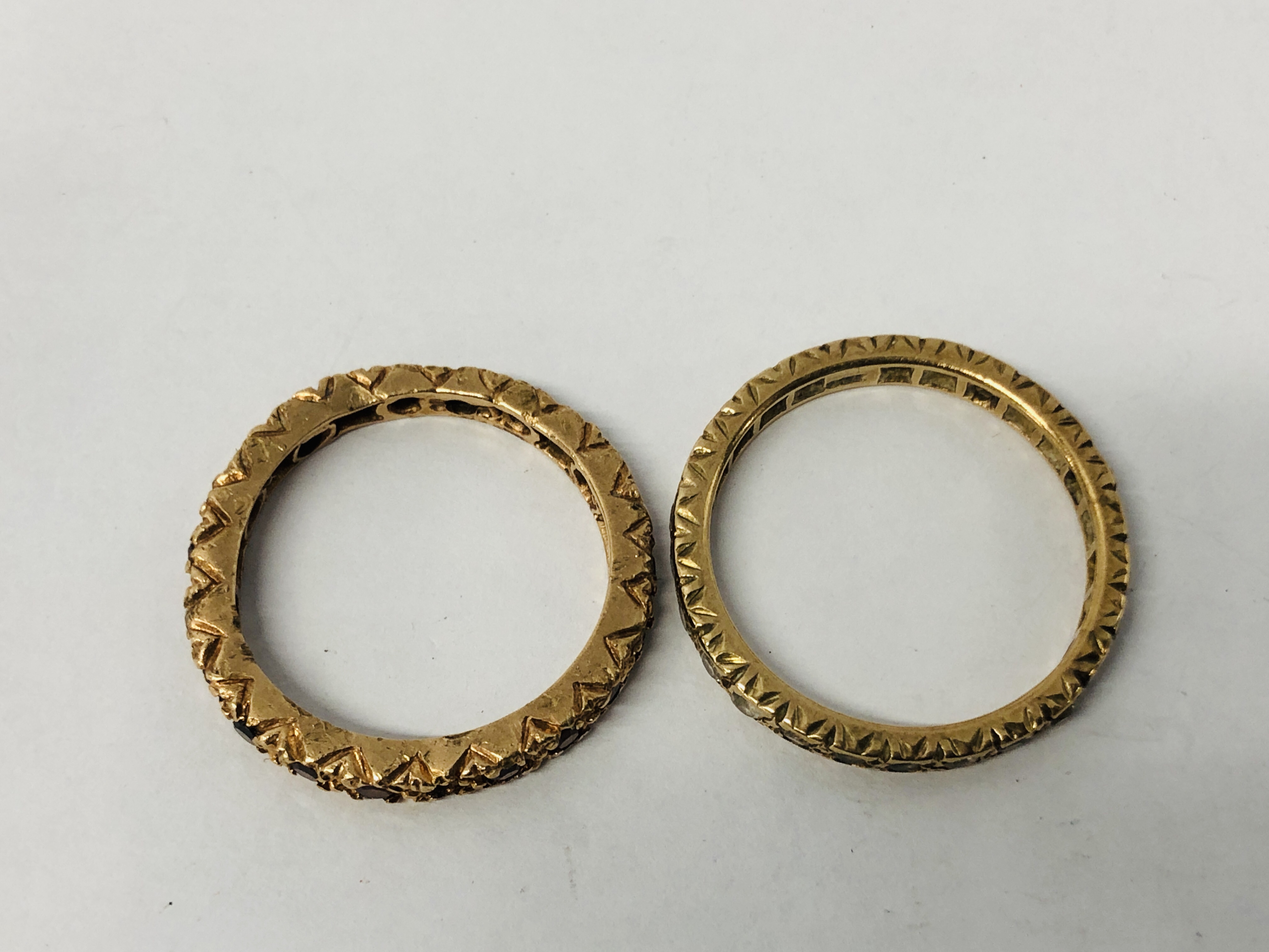 A YELLOW METAL ETERNITY RING, - Image 8 of 11