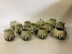 A COLLECTION OF 12 PIECES OF HOLKHAM POTTERY IN THE SNOW DROP DESIGN TO INCLUDE 9 COFFEE MUGS,