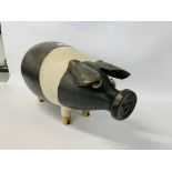 A LARGE POTTERY SADDLE BACK PIG BY S.P.