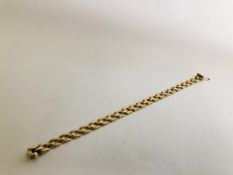 A 9CT GOLD FLAT LINK BRACELET.