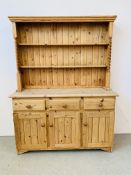 A STRIPPED PINE THREE DRAWER THREE DOOR FARMHOUSE DRESSER WITH BARLEY TWIST UPSTAND SUPPORTS W