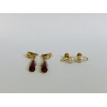 A PAIR OF 9CT GOLD SIMULATED PEARL SCREW BACK EARRINGS ALONG WITH A PAIR OF COSTUME RED TEAR DROP