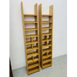 A PAIR OF MODERN LIGHT OAK FINISH LADDER STYLE MEDIA SHELVES.