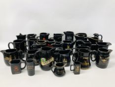 COLLECTION OF 28 ASSORTED ADVERTISING BAR WATER JUGS TO INCLUDE WADE.