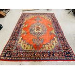 A GOOD QUALITY RED / BLUE PATTERNED EASTERN CARPET 3.3M X 2.2M.