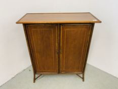 AN EDWARDIAN CANE MAHOGANY TWO DOOR CUPBOARD WITH SHELVED INTERIOR W 85CM, D 37CM, H 96CM.