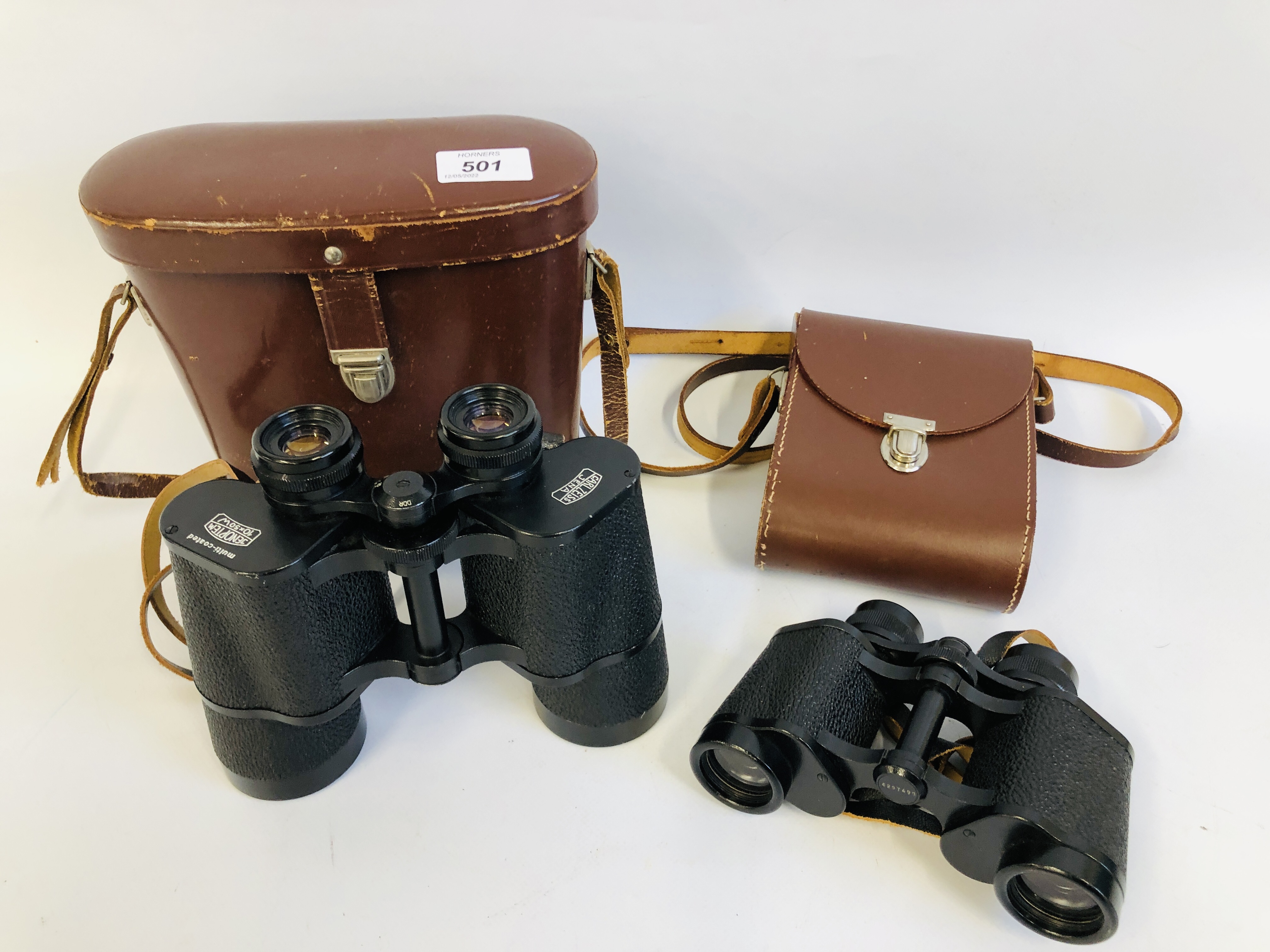 A PAIR OF CARL ZEISS JENA 10 X 50W BINOCULARS ALONG WITH A PAIR OF CARL ZEISS JENA JENOPTEM 8 X 30