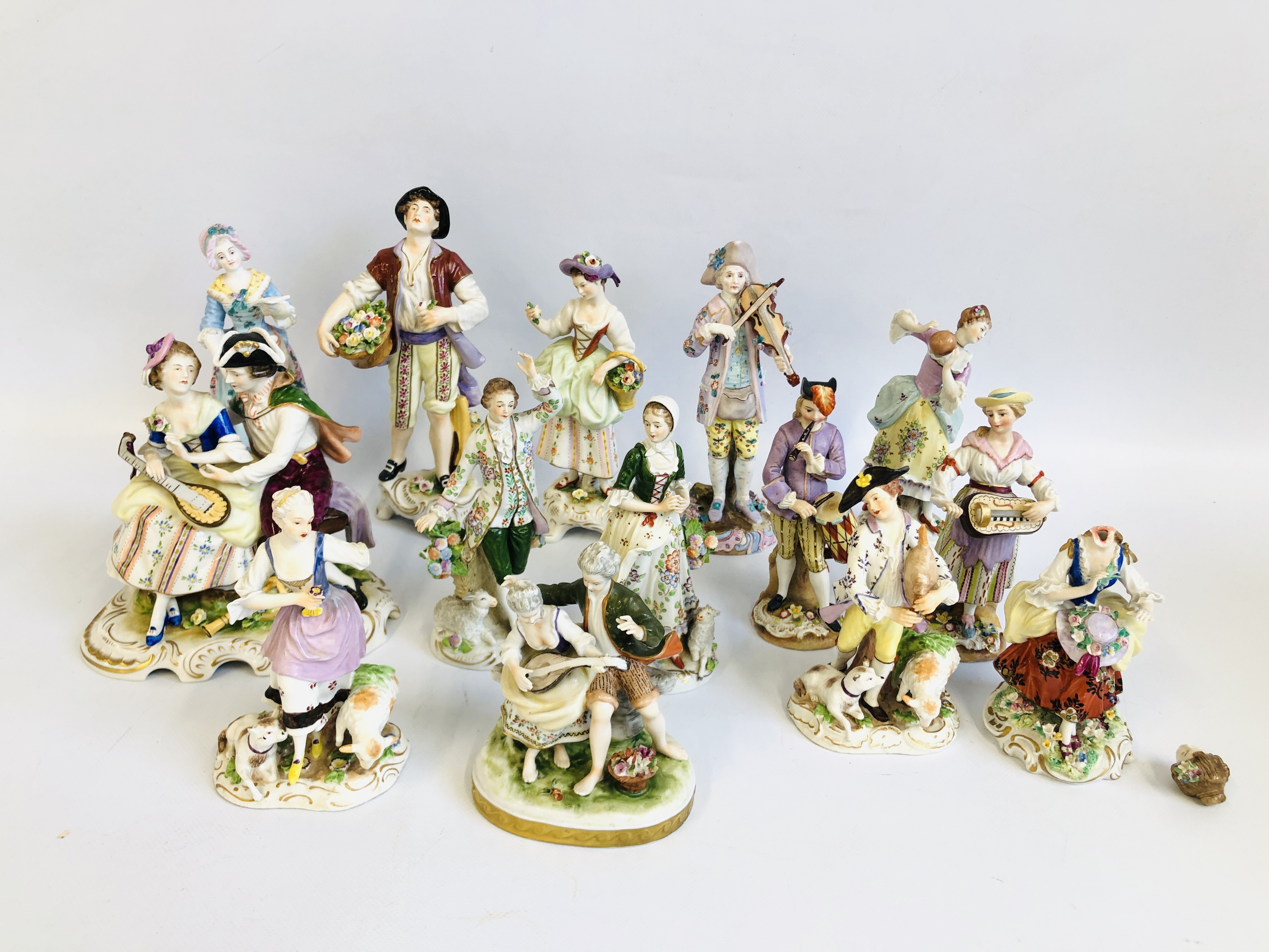 COLLECTION OF 14 CONTINENTAL CABINET FIGURES SOME BEARING CROSSED SWORDS, OTHERS REQUIRE ATTENTION.