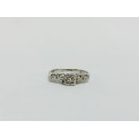 LADIES SINGLE STONE DIAMOND RING, DECORATIVE SHOULDERS MARKED PLAT (RUBBED MARKS).