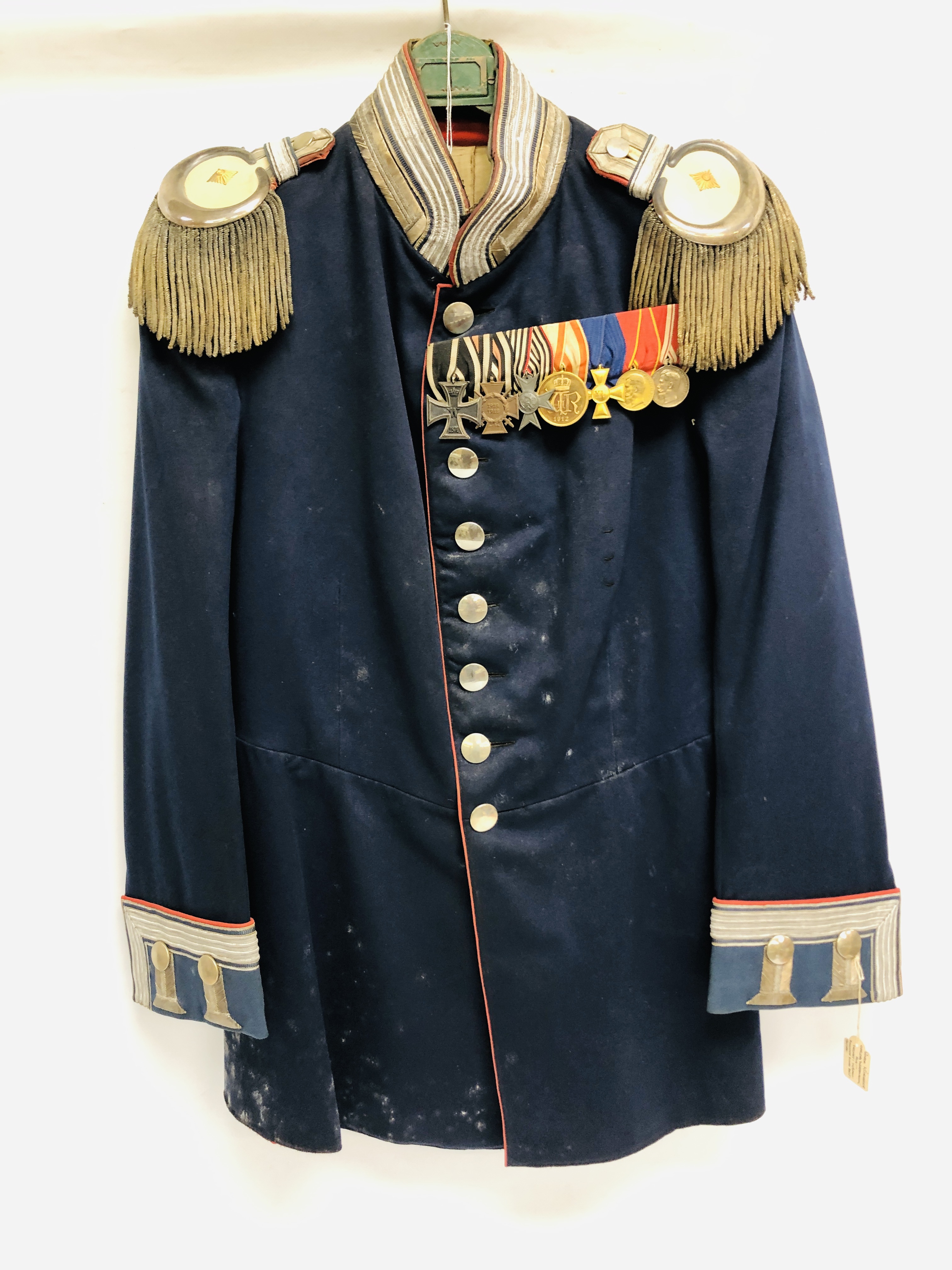 A GERMAN INFANTRY OFFICERS JACKET IN NAVY CLOTH,