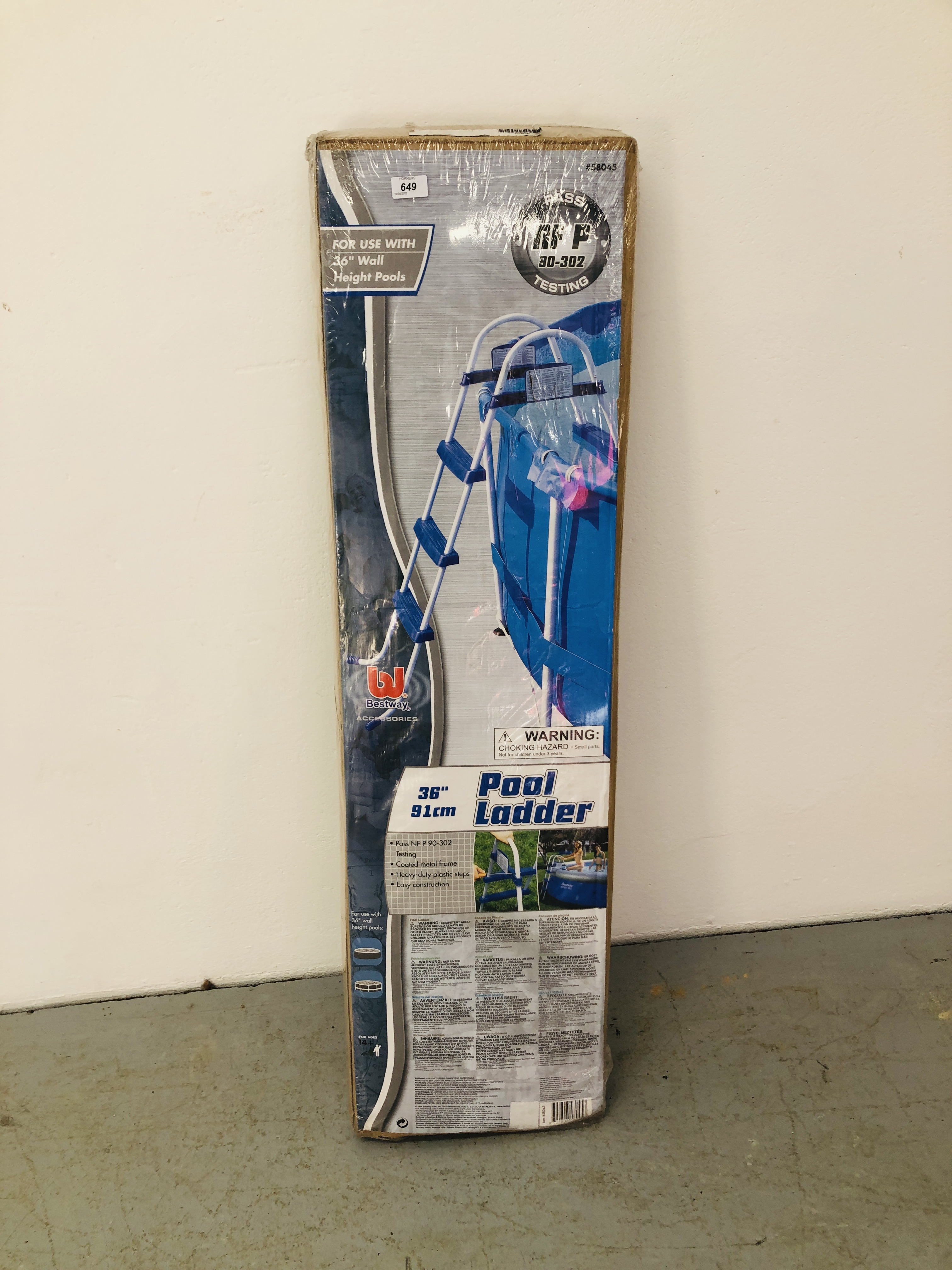 A BOXED 36 INCH SWIMMING POOL LADDER.