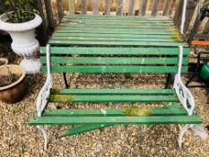 A GARDEN TABLE AND BENCH WITH DECORATIVE CAST METAL ENDS - BOTH A/F FOR RESTORATION