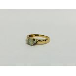 9CT GOLD 3 STONE OPAL RING.