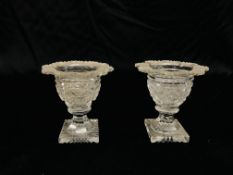 TWO LATE GEORGIAN CUT GLASS VASE SHAPED SALTS, A SQUARE BASE, (A/F CONDITION) H 9CM.