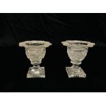 TWO LATE GEORGIAN CUT GLASS VASE SHAPED SALTS, A SQUARE BASE, (A/F CONDITION) H 9CM.
