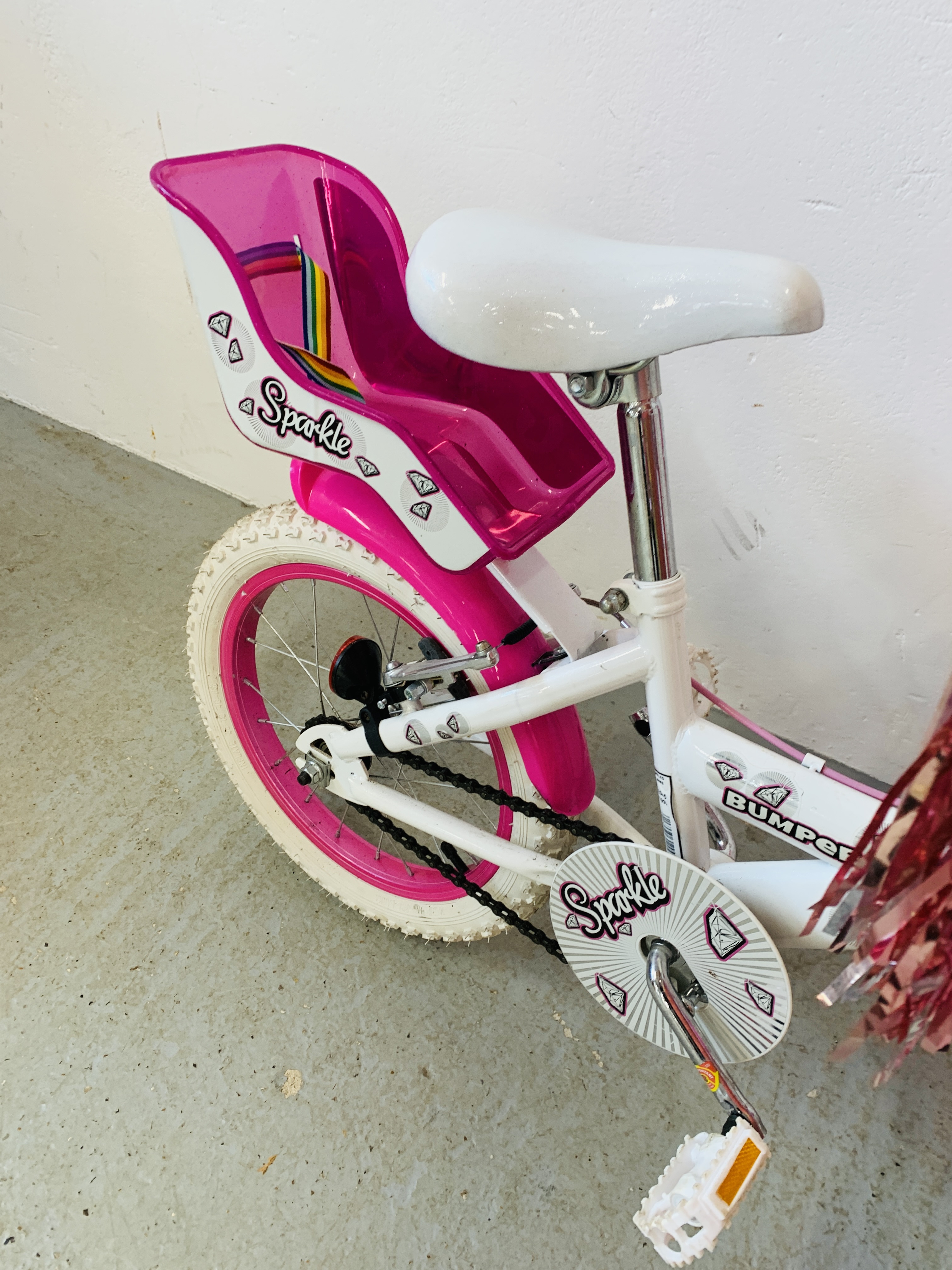 A CHILDS PINK AND WHITE BIKE ALONG WITH STABILIZERS - SOLD AS SEEN - Image 4 of 4