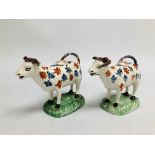 A PAIR OF SWANSEA POTTERY COW CREAMERS AND COVERS c.1800, L 18.